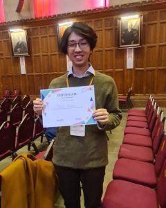 Yoshiaki Shiokawa poses with an award at the pre-CHI event.