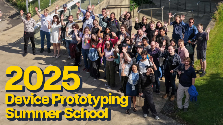 An overhead shot shows a crowd of about forty people standing outside a building waving to the camera on a sunny day. In the bottom left is yellow text reading '2025 Device Prototyping Summer School'.
